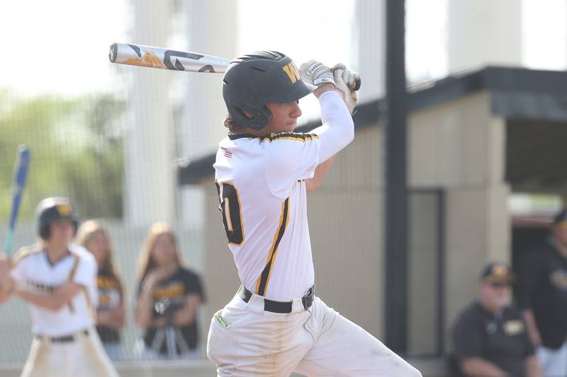 Joliet West’s Parker Schwarting connects for a 2 run double against Joliet Central on Tuesday, May 9, 2023 in Joliet.