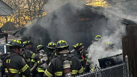 Crews battle Joliet garage fire