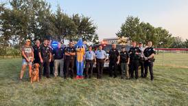 Yorkville police therapy dog Eli meets Sonic the Hedgehog at National Night Out 