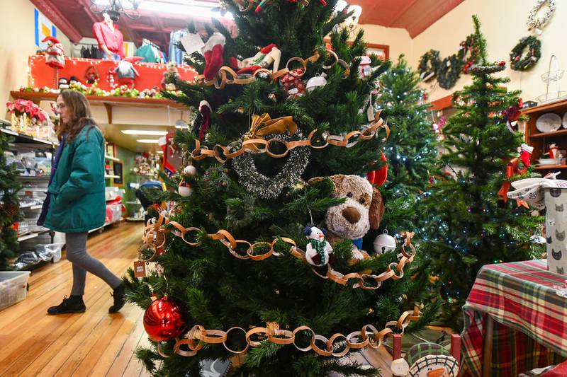 A shopper browses the variety of Christmas items for sale at Ceazar’s Palace Resale for Rescue, the thrift store operated by River Valley Animal Rescue in Momence. The store, at 110 E. Washington St., is open one more week, from 11 a.m. to 4 p.m. Tuesday through Saturday.