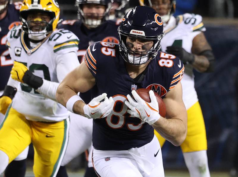 Chicago Bears tight end Cole Kmet picks up yardage after a catch in the Green Bay Packers secondary Saturday, December 20, 2025, during their game at Soldier Field in Chicago.