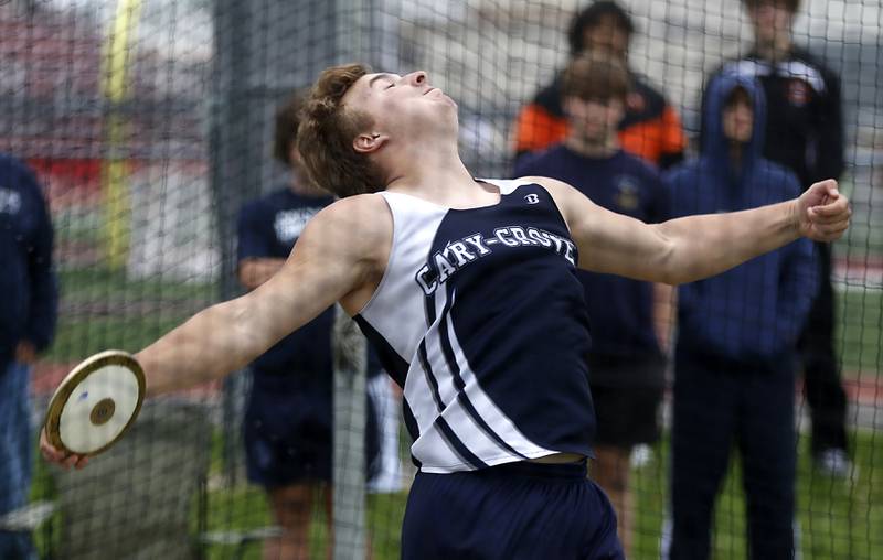 Cary-Grove’s Zachary Petko throws the discus during the IHSA Class 3A Huntley Boys Track and Field Sectional Wednesday, May 18, 2022, at Huntley High School.