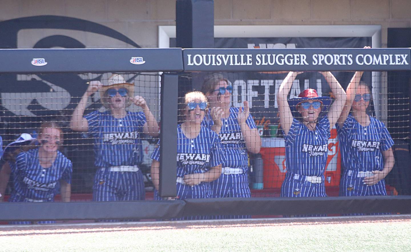 Members of the Newark softball team cheer on their teammates in the Class 1A State Softball semifinal game against Illini Bluffs on Friday, June 3, 2022 at the Louisville Slugger Sports Complex in Peoria.
