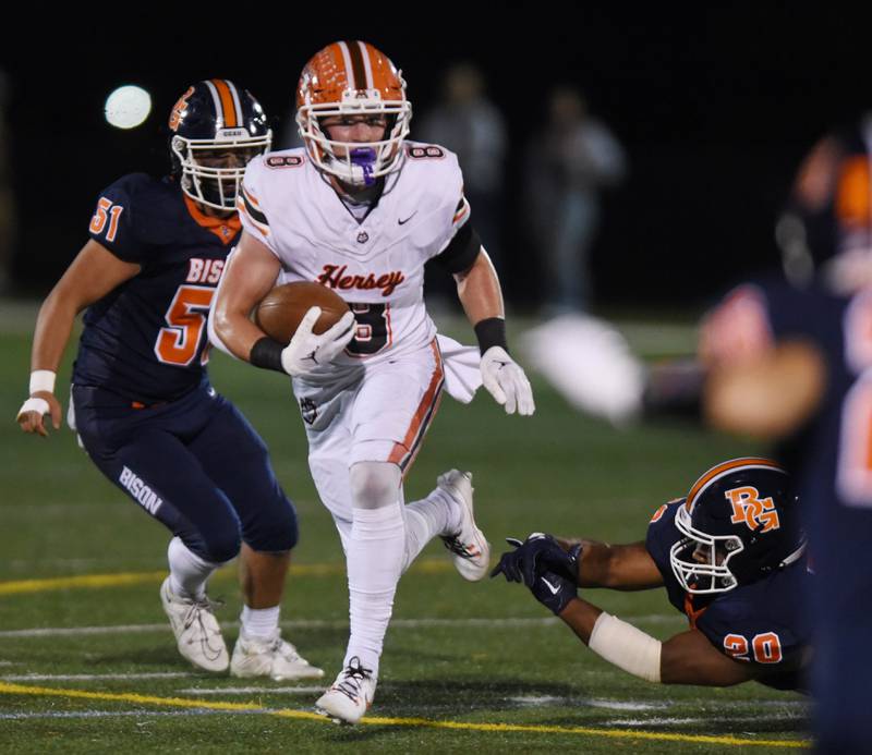 Joe Lewnard/jlewnard@dailyherald.com
Hersey’s Carson Grove carries a punt return during Friday’s game at Buffalo Grove.
