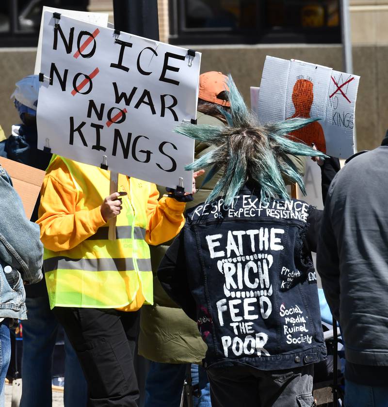 Demonstrators displayed a wide variety of signs and attire during the No Kings rally on Saturday, March 28, 2026, in downtown Oregon, Illinois.