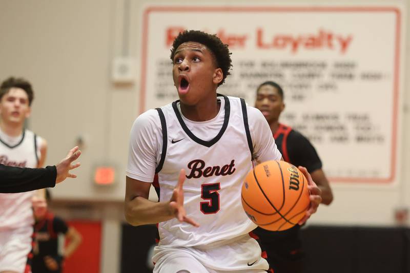 Benet’s Perry Tchiegne looks to make a play against Bolingbrook in the Class 4A Bolingbrook Sectional championship game on Friday, March 6, 2026 in Bolingbrook.