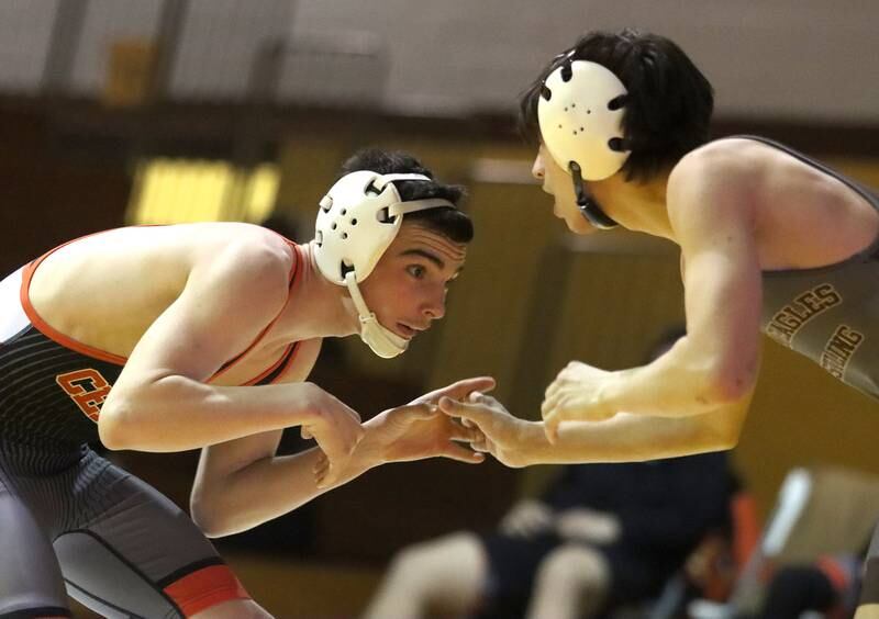 Jacobs’ Anthony Martinez, right,  battles Crystal Lake Central’s Jackson Marlett at 113 pounds in varsity wrestling on Thursday, Jan. 16, 2025, at Jacobs High School in Algonquin.