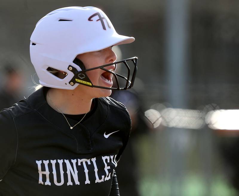 Huntley's Lyla Ginczycki cheers after she scored a run during a Fox Valley Conference softball game against Crystal Lake Central on April 7, 2026, at Crystal Lake Central High School.