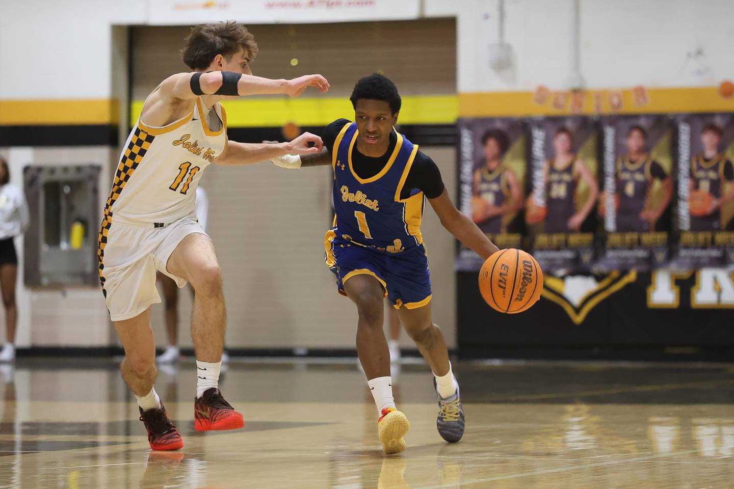 Joliet Central’s Bernal Fox works the ball up court against Joliet West on Tuesday, Feb. 17, 2026 in Joliet.