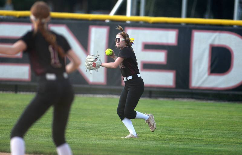 Montini’s Teagan O’Connor throws to the infield during a Class 3A Benedictine Supersectional against St. Laurence on Monday, June 9, 2025 in Lisle.