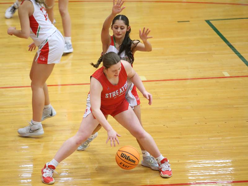 Streator's Leah Krohe dribbles into L-P's Nathali Aguirre on Tuesday, Jan. 28, 2025 in Sellett Gymnasium at L-P High School.