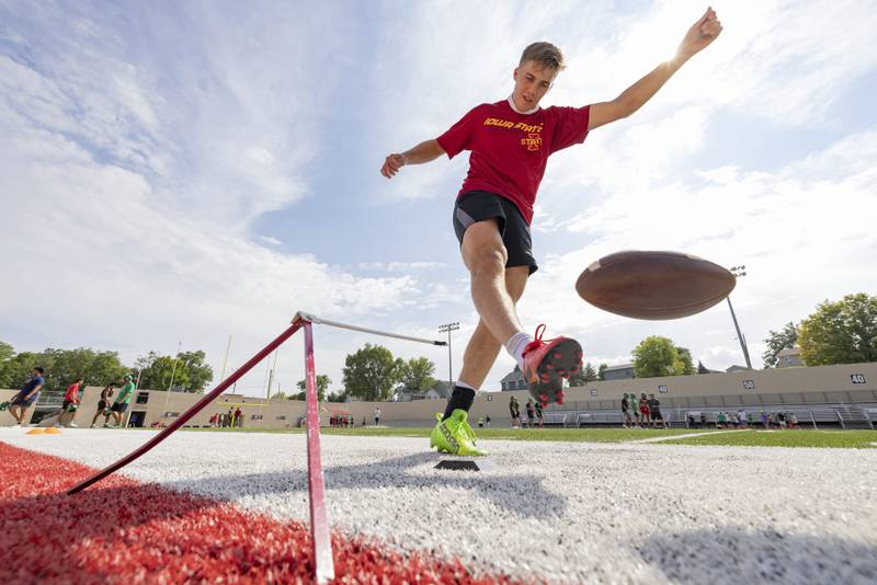 Seth Adams practices his kickoffs at La Salle-Peru's first practice of the year at Howard Fellows Stadium on August 7, 2023.