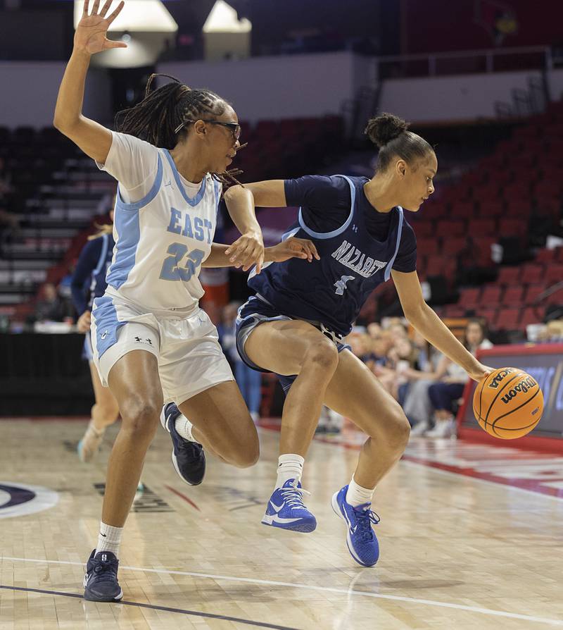 Nazareth's Mia Gage handles the ball against Belleville East’s Saudia Brock Friday, March 6, 2026, in the Class 4A girls state semifinal game at CEFCU Arena at ISU.
