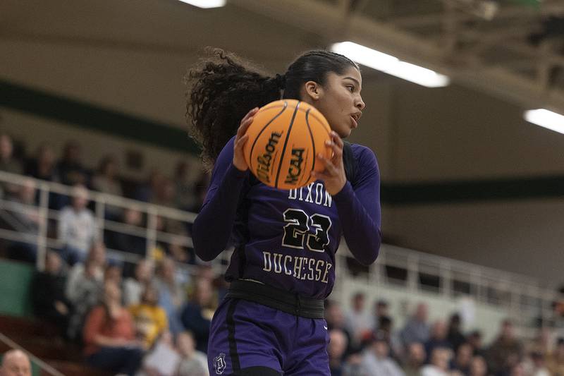 Dixon's Ahmyrie McGowan pulls down a rebound against Sterling Thursday, Feb. 27, 2025, during the Class 3A girls Sectional title at Rockford Boylan High School.