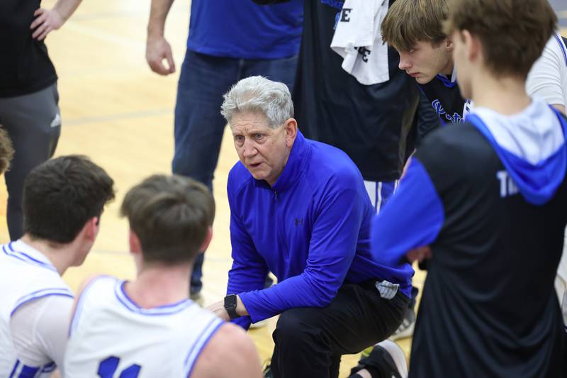 Peotone head coach Ron Oloffson talks to his players in a timeout during the Blue Devils' 64-52 victory over Beecher on Wednesday, Jan. 28, 2026.