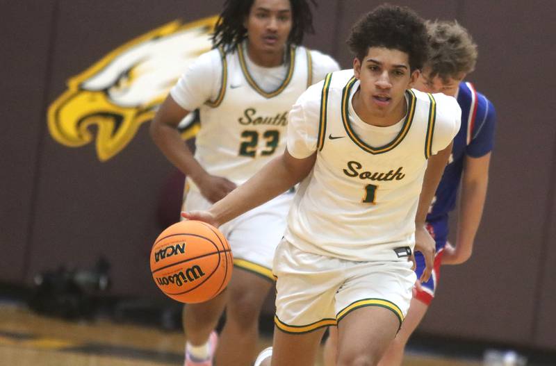 Crystal Lake South’s Noah Cook brings the ball up against Lakes in varsity boys basketball Hinkle Holiday Classic action on Friday, Dec. 26, 2025, at Jacobs High School in Algonquin.