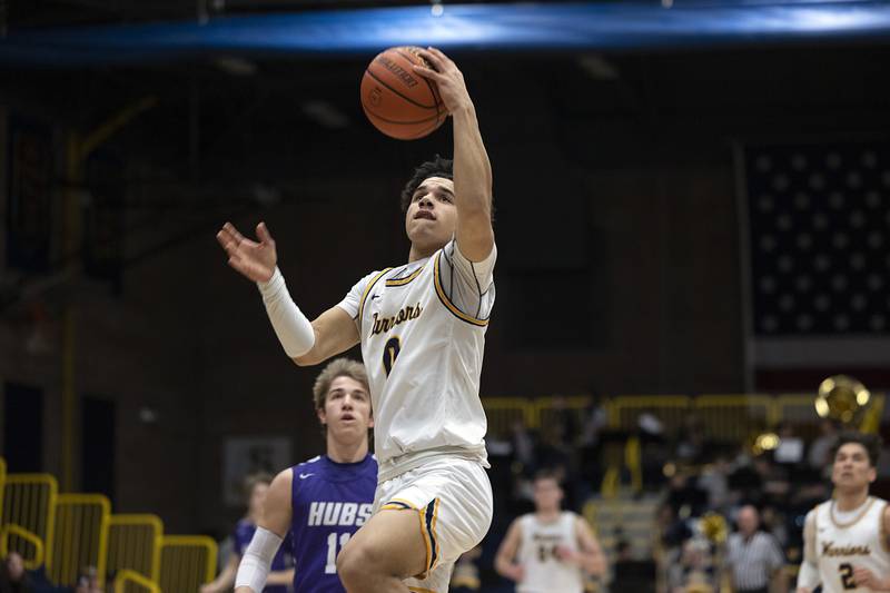 Sterling’s Andre Klaver goes in for a layup against Rochelle Tuesday, Jan. 31, 2023.