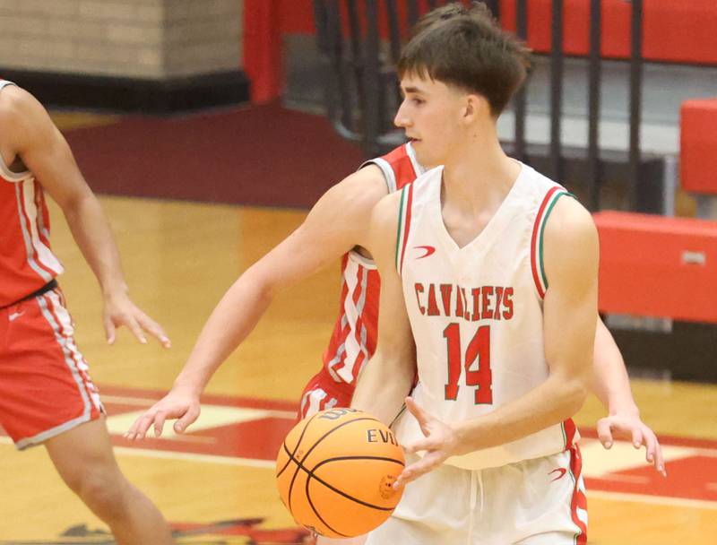 L-P's Wyatt Kilday looks to hand the ball off during the Dean Riley Shootin' The Rock Thanksgiving Tournament on Monday Nov. 24, 2025 in Kingman Gymnasium at Ottawa High School.