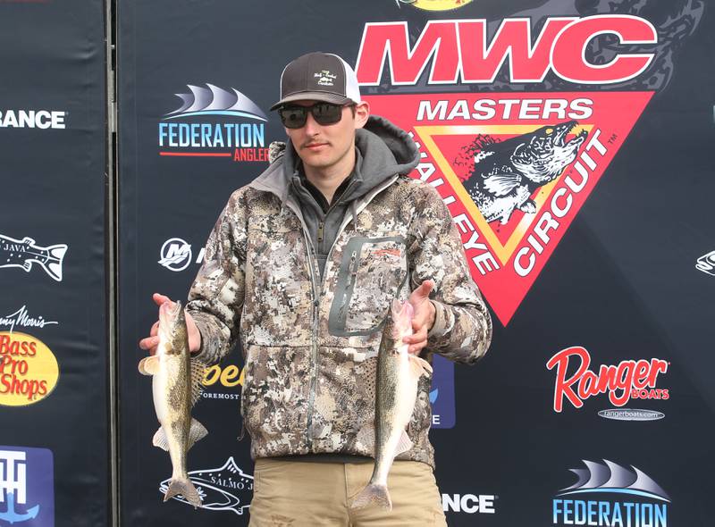 Dawson Ploch of Tonica holds his Walleye catch during the annual Masters Walleye Circuit tournament on Friday, March 21, 2025 at the Spring Valley Boat Club.