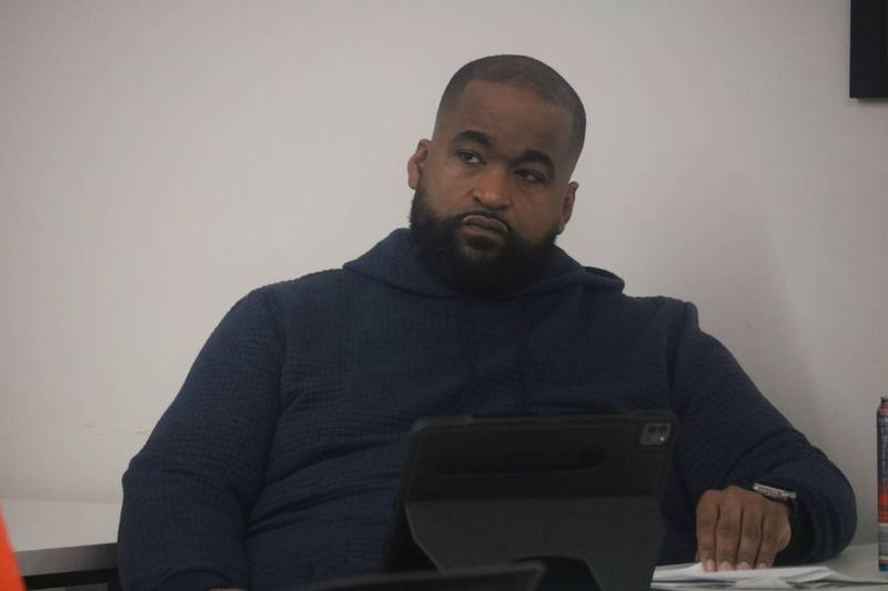 Board Member Andre Powell sits in on the Feb. 22 meeting of the DeKalb Citizen Police Review Board.
