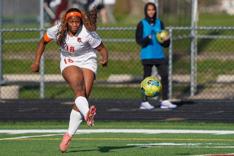 Oswego’s Jordyn Washington (18) takes a shot against Bartlett during a soccer mach in the Plainfield Classic  at Plainfield North High School on Tuesday, April 15, 2025.