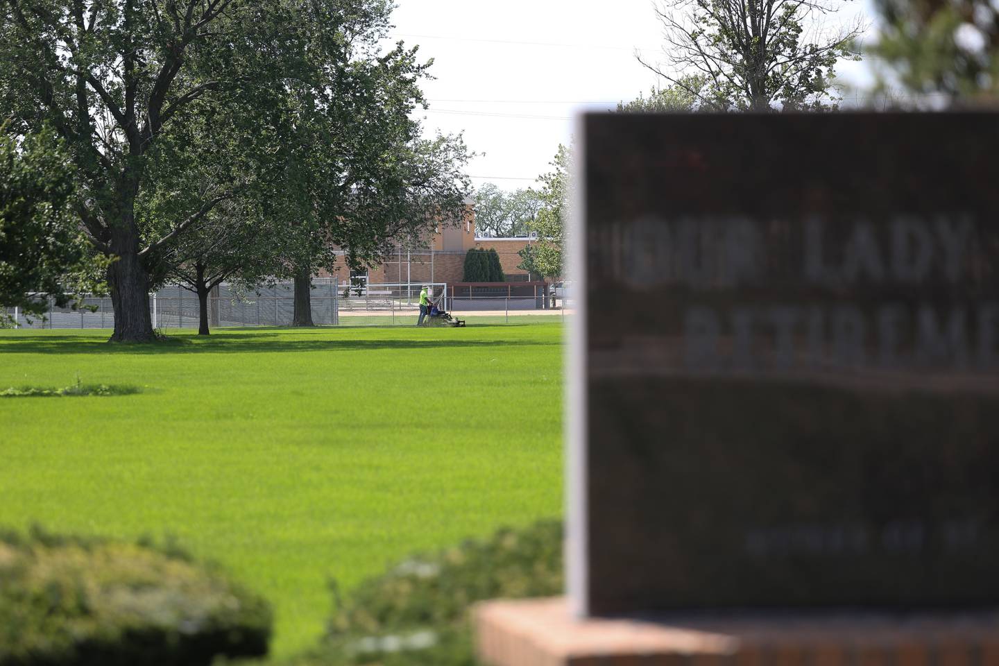 Joliet Catholic Academy, seen in the distance, is interested in purchasing neighboring Our Lady of Angels to expand the campus.