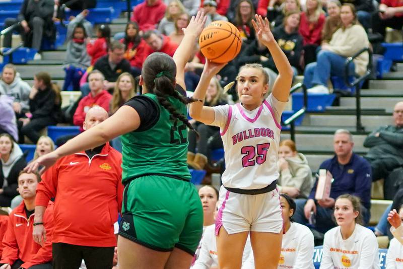 Batavia’s Samantha Jansey (25) shoots a 3-pointer against York's Amelie Van Heukelum (22) during a Class 4A Geneva Regional final basketball game at Geneva High School on Thursday, Feb. 20, 2025.