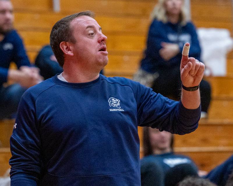 Lisle's Head Coach Andrew Weber calls play on sideline on Wednesday, Feb. 18, 2026 at Streator High School in Streator.