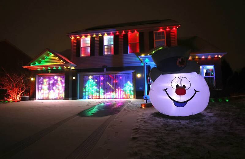 The house at 582 Magnolia Street Thursday, Dec. 19, 2024, in DeKalb. This home is one of the entries in this year’s DeKalb Park District Holiday House Decorating Contest.