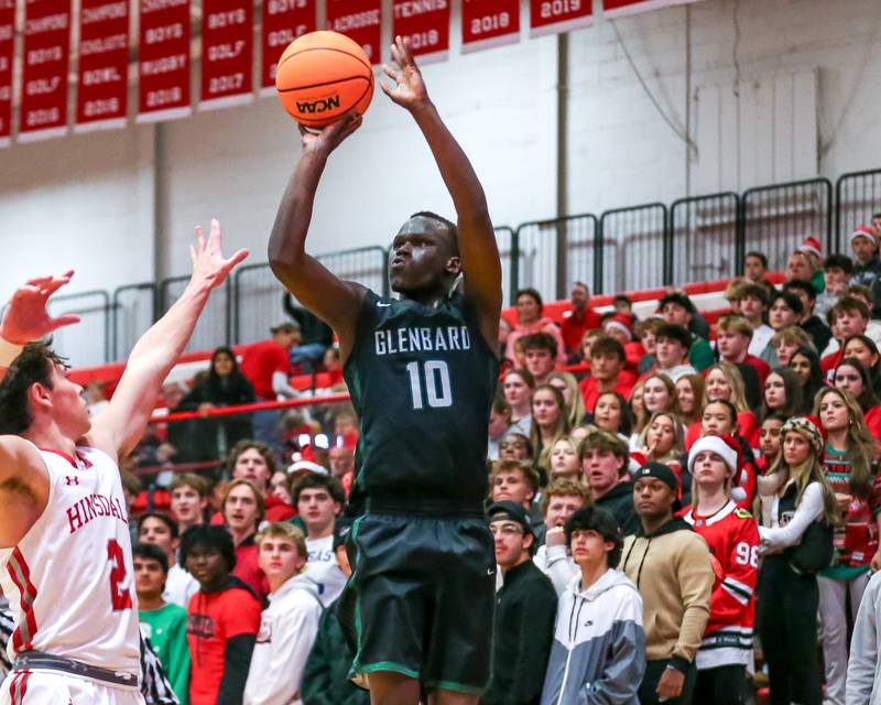 Glenbard West's Josh Abushanab (10) shoots a jump shot during their basketball game between Glenbard West at Hinsdale Central, Friday  Dec 6, 2024  in Hinsdale.