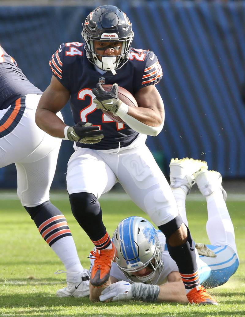 Chicago Bears running back Khalil Herbert breaks a Lions tackle during their game Sunday, Nov. 13, 2022, at Soldier Field in Chicago.