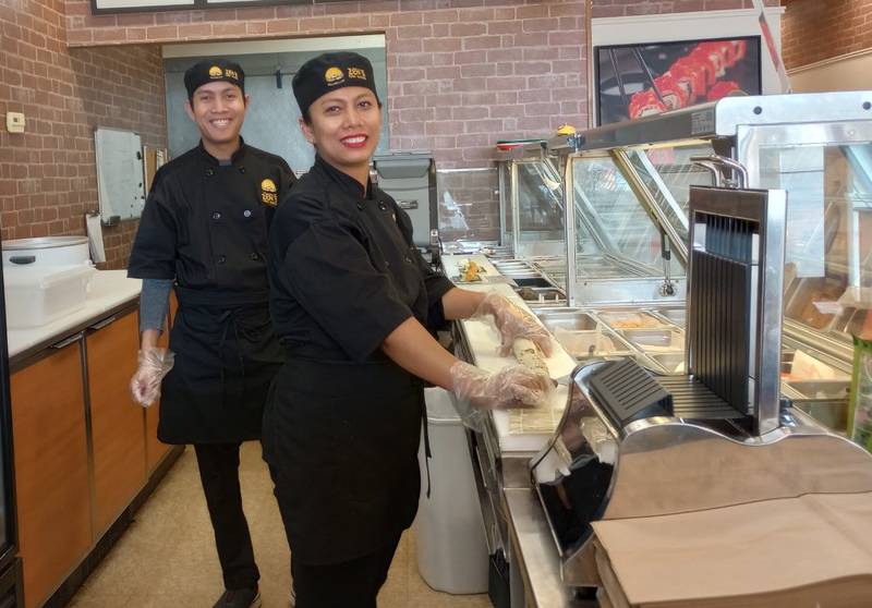Khine Zaw and his wife Cho Wai at their newly opened restaurant, Zen’s Sushi Express, 1459 E. State St., Geneva.