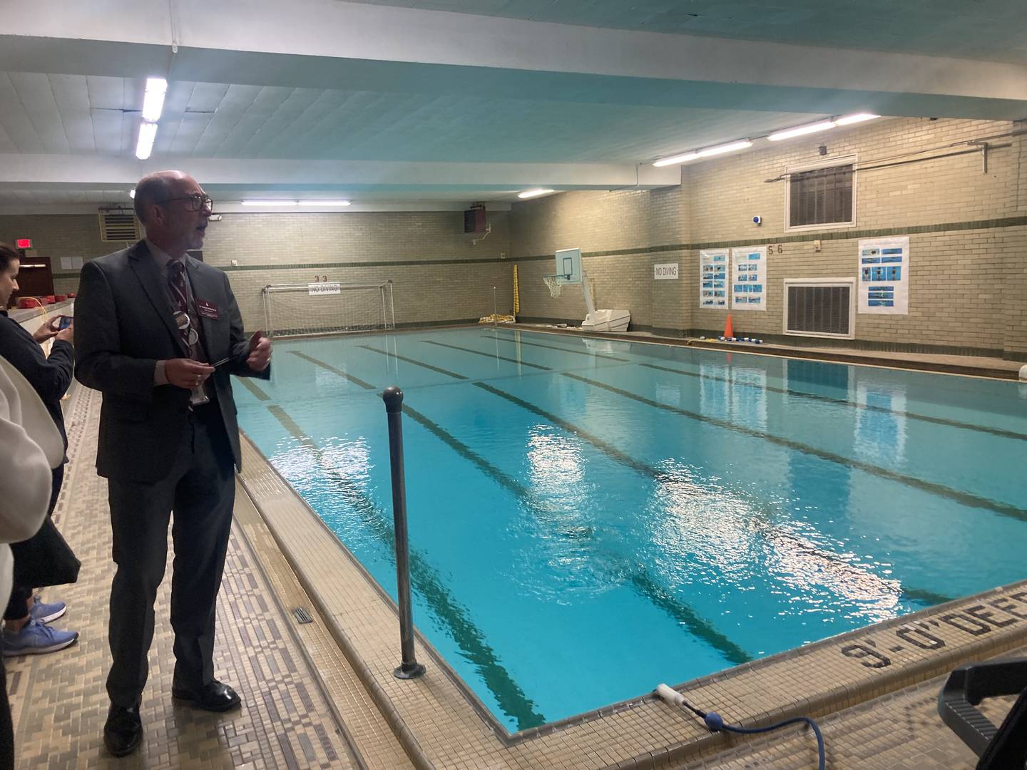 Lockport School District 205 Superintendent Dr. Robert McBride guides a tour through the Lockport Township High School's Central Campus pool area in September 2023.  The public tour was held prior to a school board meeting to show what renovations and improvements are needed at the 114-year-old building.