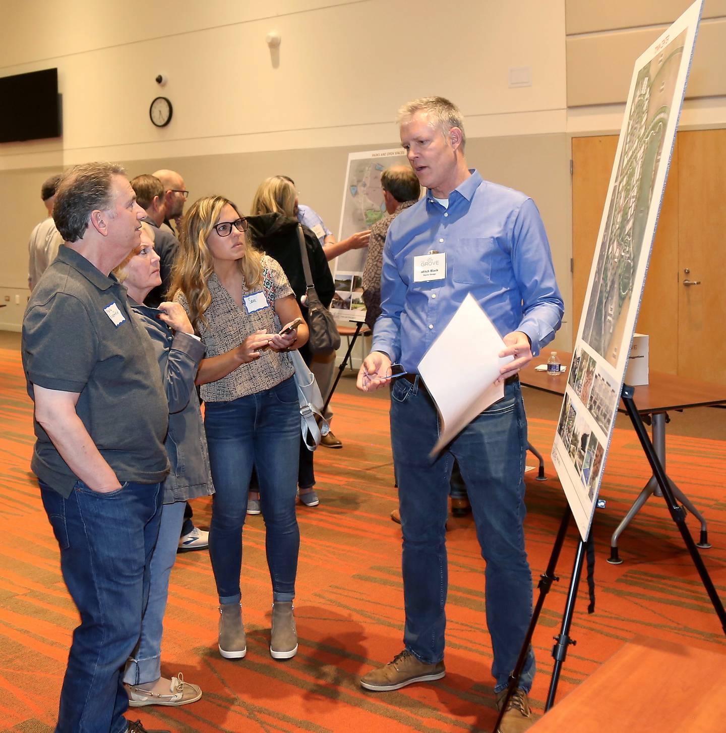 Mitch Black of Norris Design (land consultant for Crown) speaks about the proposed Town Center at The Grove community engagement meeting on Monday, June 12, 2023 at Waubonsee Community College in Sugar Grove.
