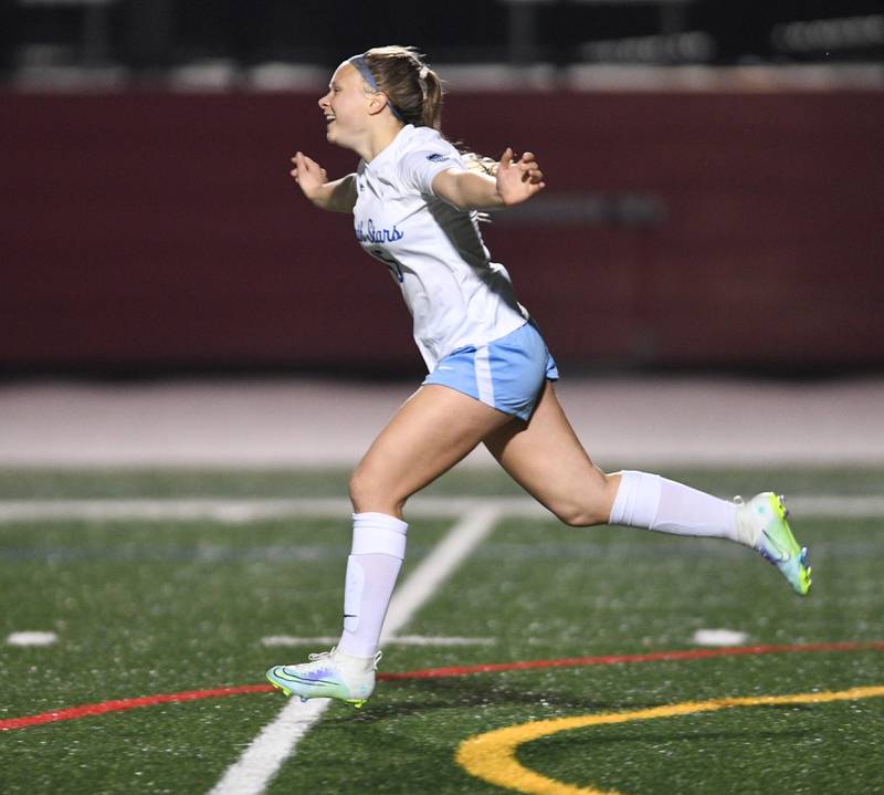 John Starks/jstarks@dailyherald.com
St. Charles North’s Lauren Balster celebrates her game-winning shootout goal against Benet Academy in the Naperville Invitational girls soccer tournament on Friday, April 22, 2022.
