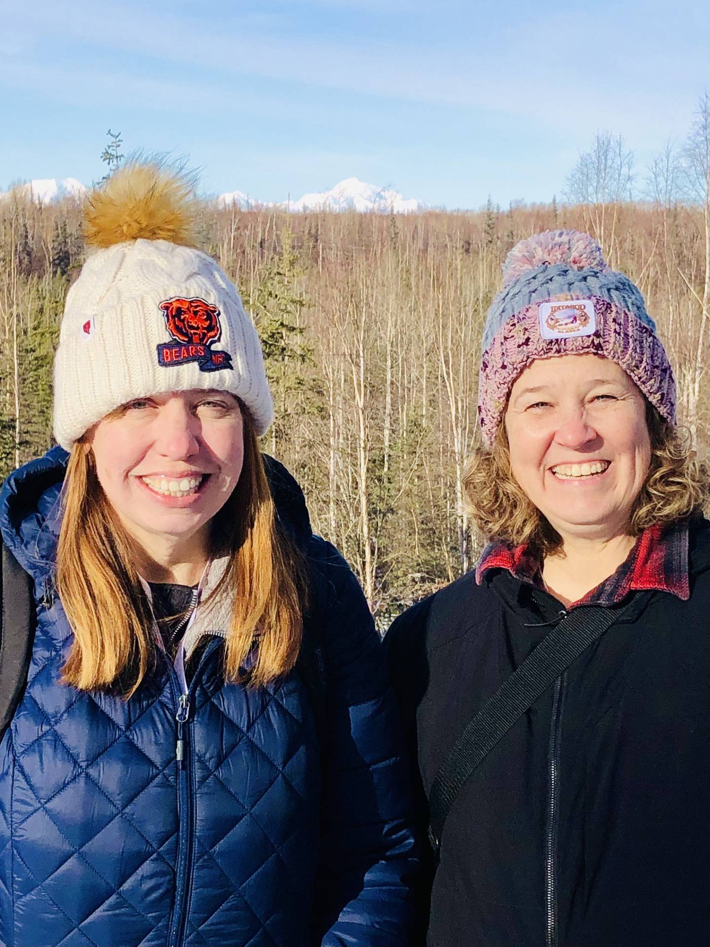 Christy Egel and Tracy Beling, educators at Lincoln Elementary School in DeKalb, pose for a photo at a conference in Anchorage, Alaska, that featured the 2025 Iditarod sled dog race.