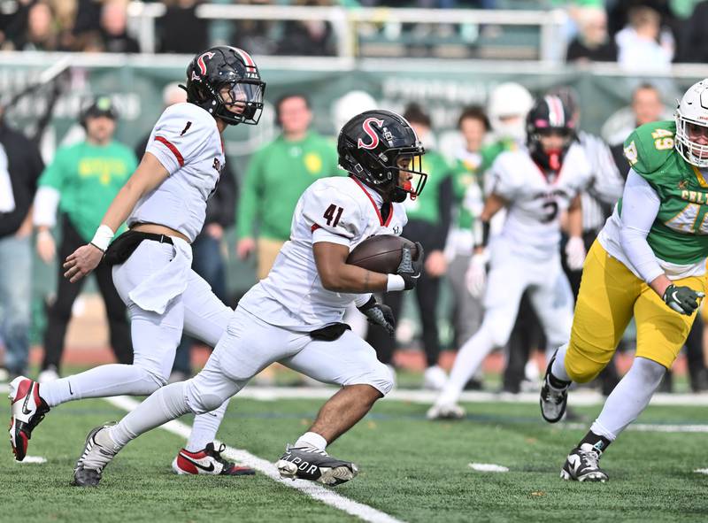 Springfield's Bryce Bryant (41) runs the ball during the class 5A first round playoff game against Providence Catholic on Saturday, NOV. 01, 2025, at New Lenox.