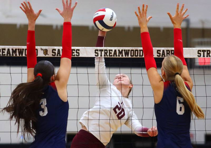 Prairie Ridge’s Ava Bell hits the ball against St. Viator in IHSA Class 3A Super-Sectional girls volleyball at Streamwood High School in Streamwood on Monday, November 10, 2025.