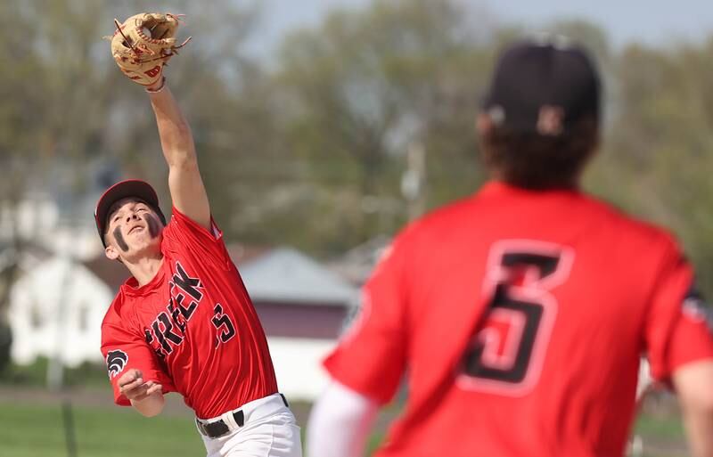 Indian Creek's Kalab Helgesen lunges and catches a fly ball during their game against IMSA Monday, May 9, 2022, in Shabbona.