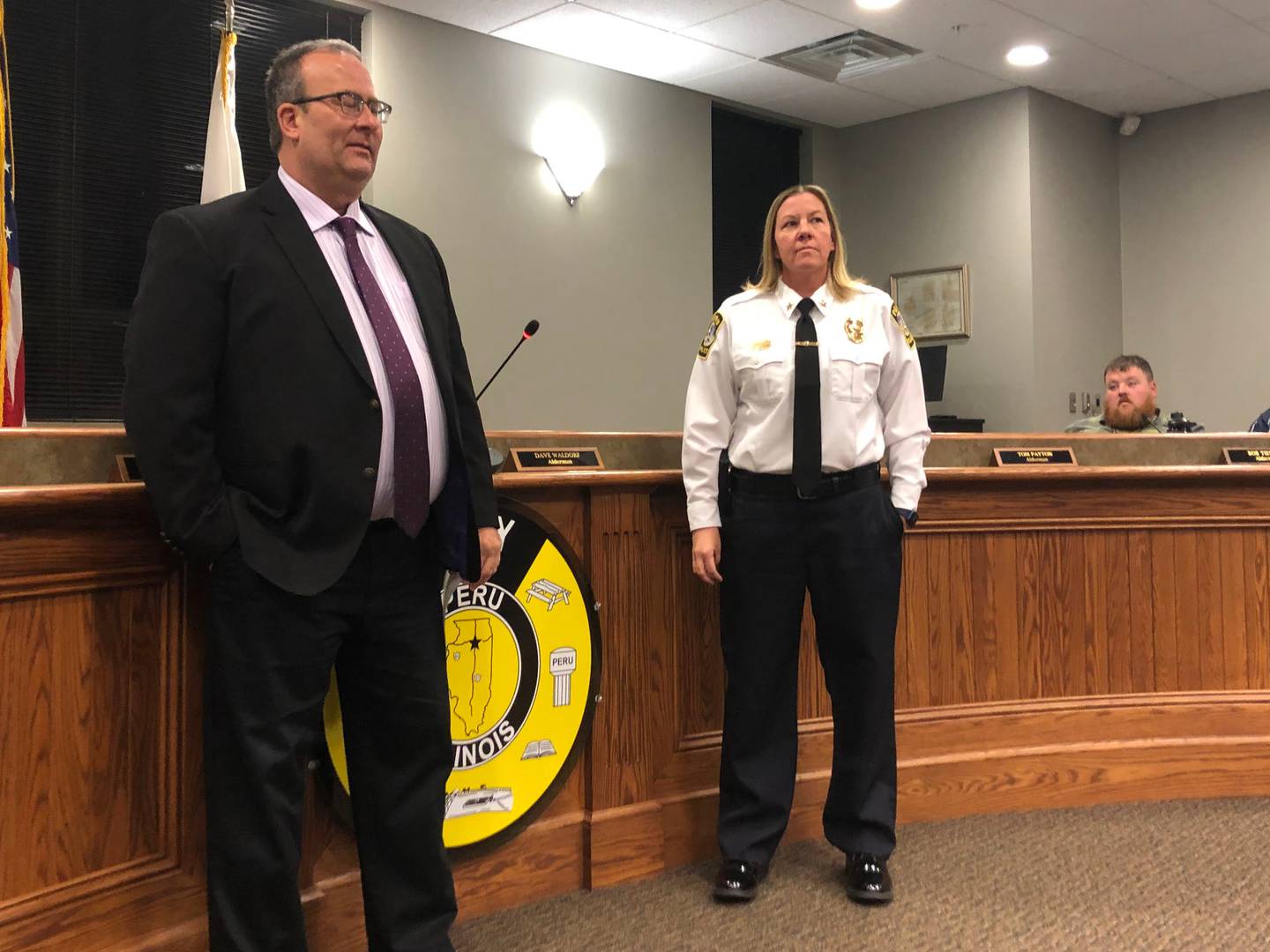 Peru Mayor Ken Kolowski swears in Sarah Raymond as the first female police chief in Peru and in La Salle County on Monday, Nov. 21, 2022.