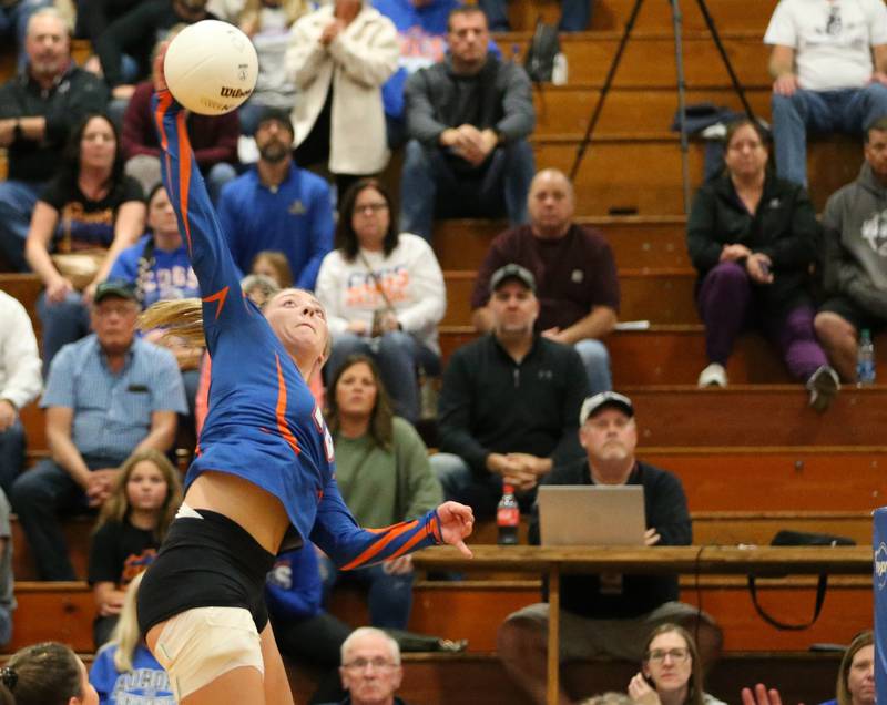 Genoa-Kingston's Kaitlin Rahn (6) sends a kill past Quincy Notre Dame's Abbey Schreacke (14) in the Class 2A Supersectional volleyball game on Friday, Nov. 4, 2022 at Princeton High School.