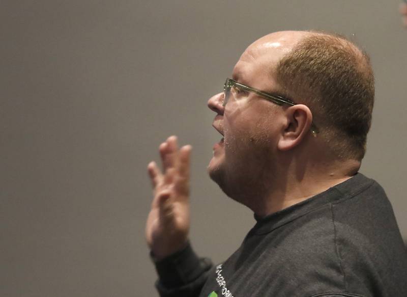 Director Andrew Hillier speaks to the cast during a rehearsal for McHenry Community High School’s production of “The SpongeBob Musical” on Tuesday, March 7, 2023, at the school’s Upper Campus.