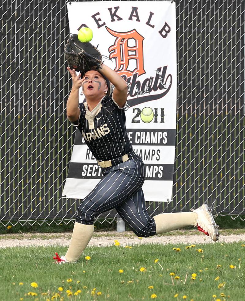 Sycamore's Addison McLaughlin makes a running catch in centerfield Friday, May 2, 2025, during their game at DeKalb High School.