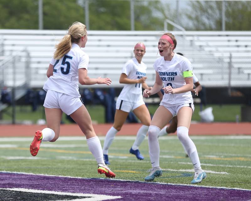 Downers Grove South's Skylar Swanson (25) and Emily Petring (13) celebrate Swanson's game winning goal during soccer match between Downers Grove North at Downers Grove South.  May 6, 2023.