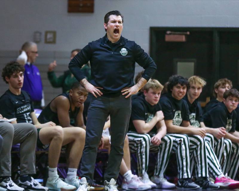 Glenbard West's head coch Jason Opoka yells out a set during their basketball game between Glenbard West at Downers Grove North. Jan 24, 2025 in Downers Grove.