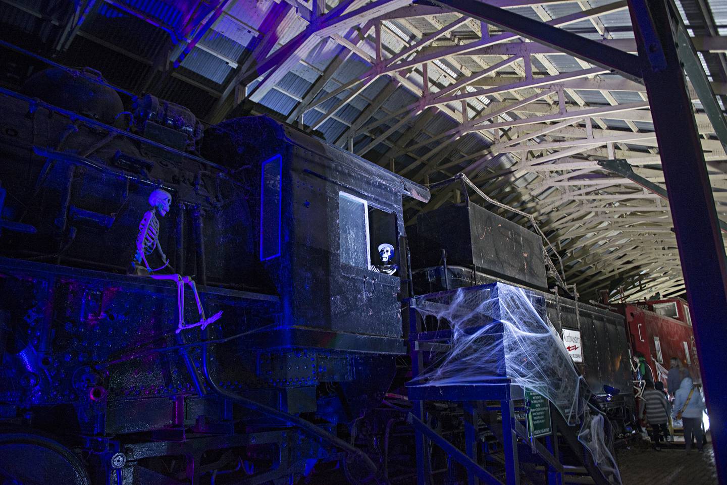 A skeleton crew mans the train at the Dillon Home Saturday, Oct. 23, 2021 during the Sterling Park District's fourth annual "Haunted Train Walk" in Sterling. Hundred of visitors braved zombie children, ghastly ghosts and wicked witches.