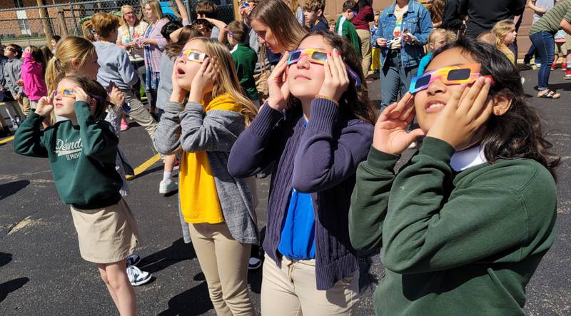 There were varying degrees of astonishment from students from St. Michael the Archangel Catholic School in Streator as they took in Monday's solar eclipse.