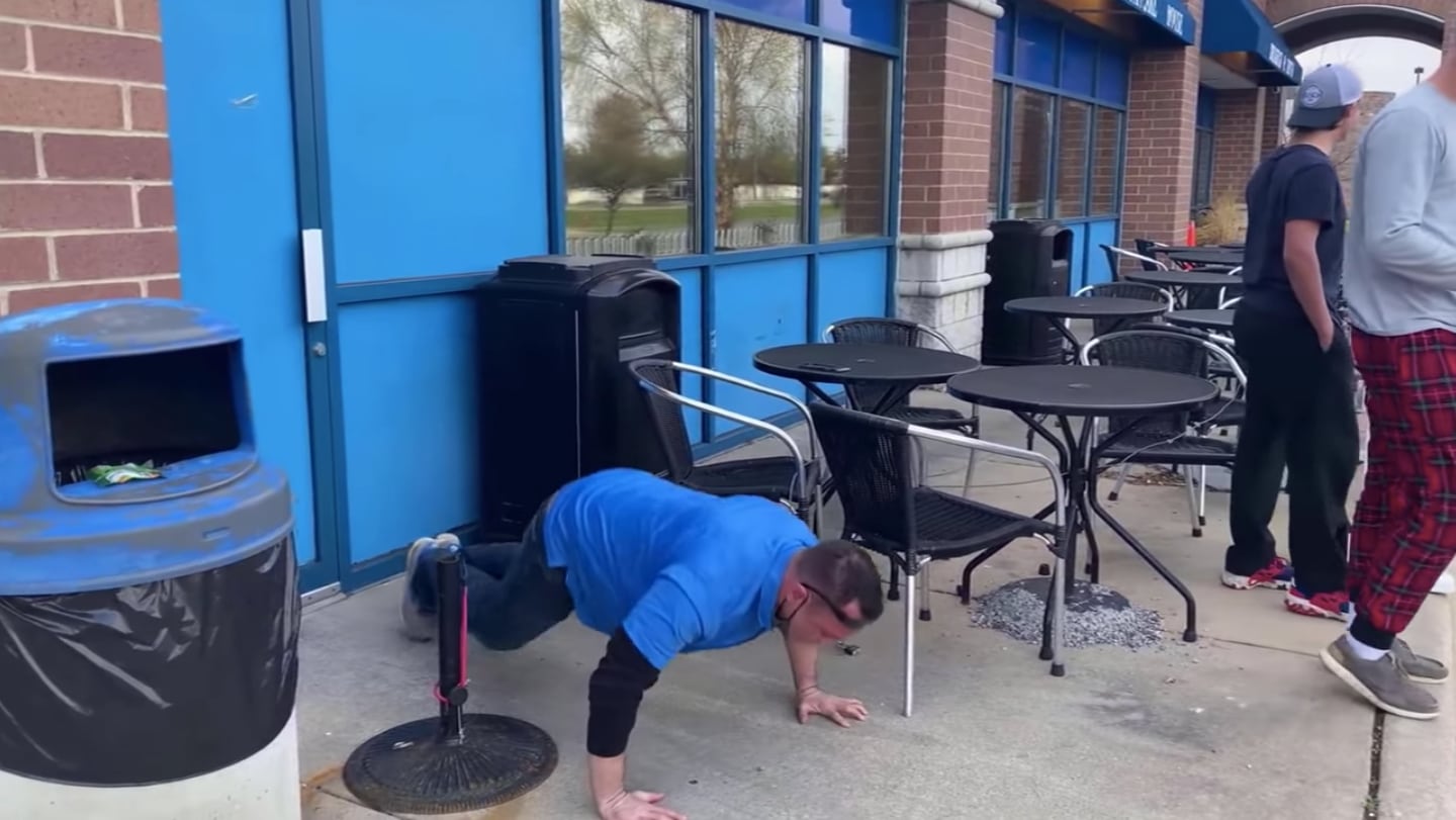 John Resedean performing push-ups at the request of Shane Divis, a member of Save Our Siblings group, which is "committed to keeping our communities protected and safeguarding our youth."