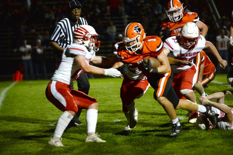 Byron's Brayden Knoll (1) heads to the end zone against Oregon on Friday, Sept. 27, 2024. The Tigers remained undefeated with a 49-7 win over the Hawks.