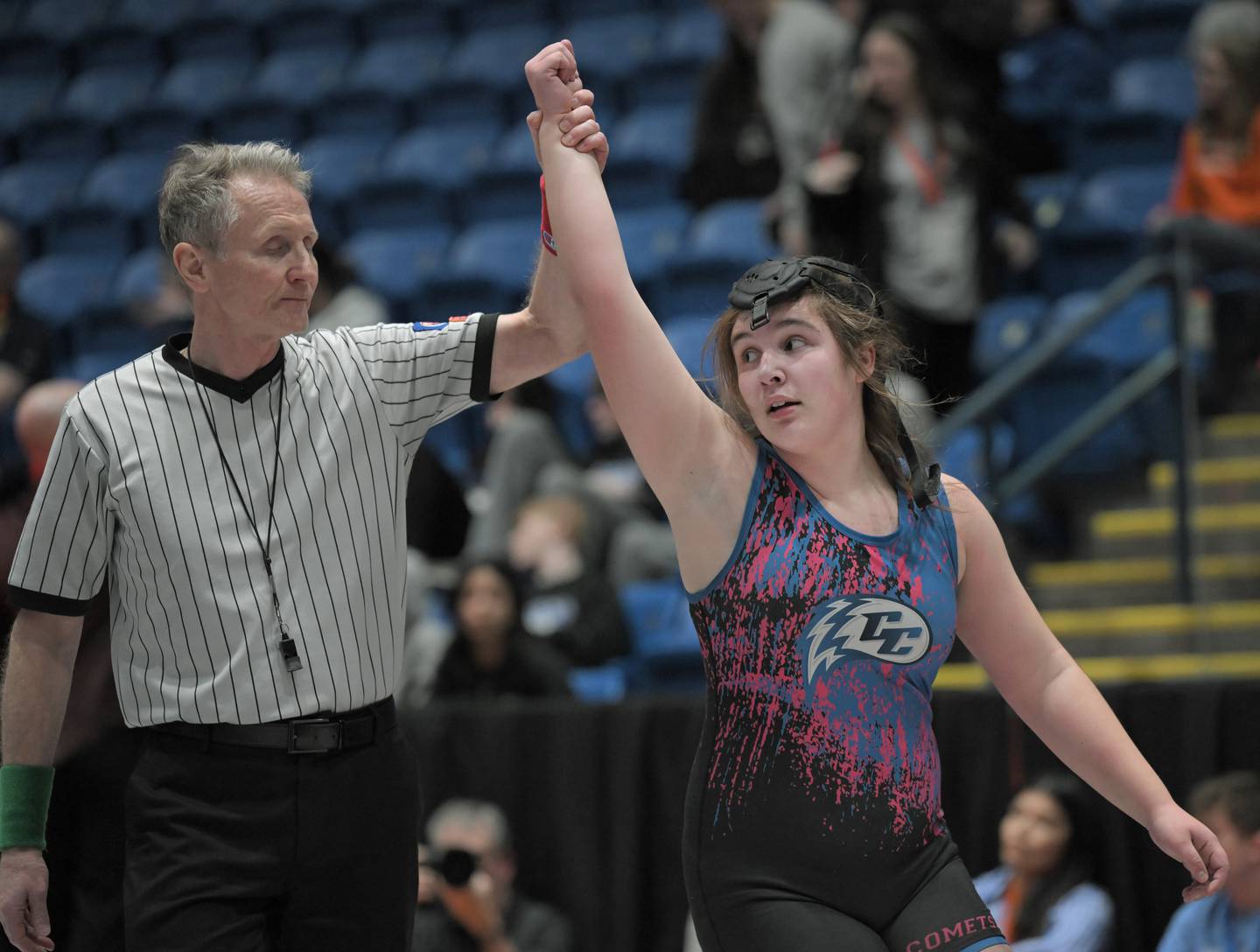 Payton Temple, of Iroquois West is declared the winner after beating Chicago Kelly’s Sara Martiniz-Lopez in the 190-pound class at the girls wrestling state finals tournament at Grossinger Arena in Bloomington on Saturday, Feb. 28, 2026.